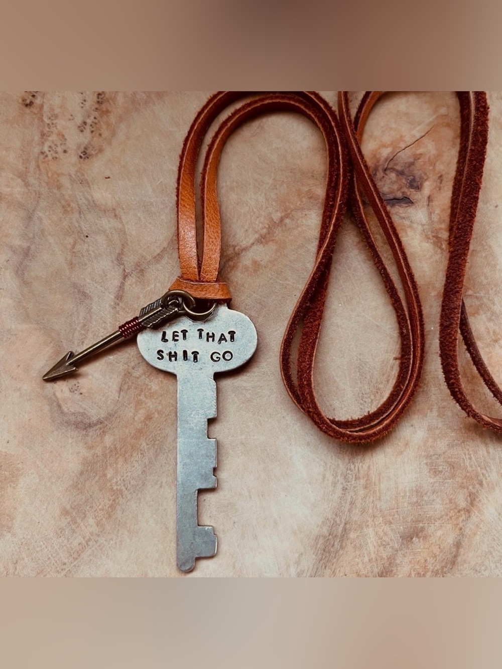Hand stamped key and arrow necklace